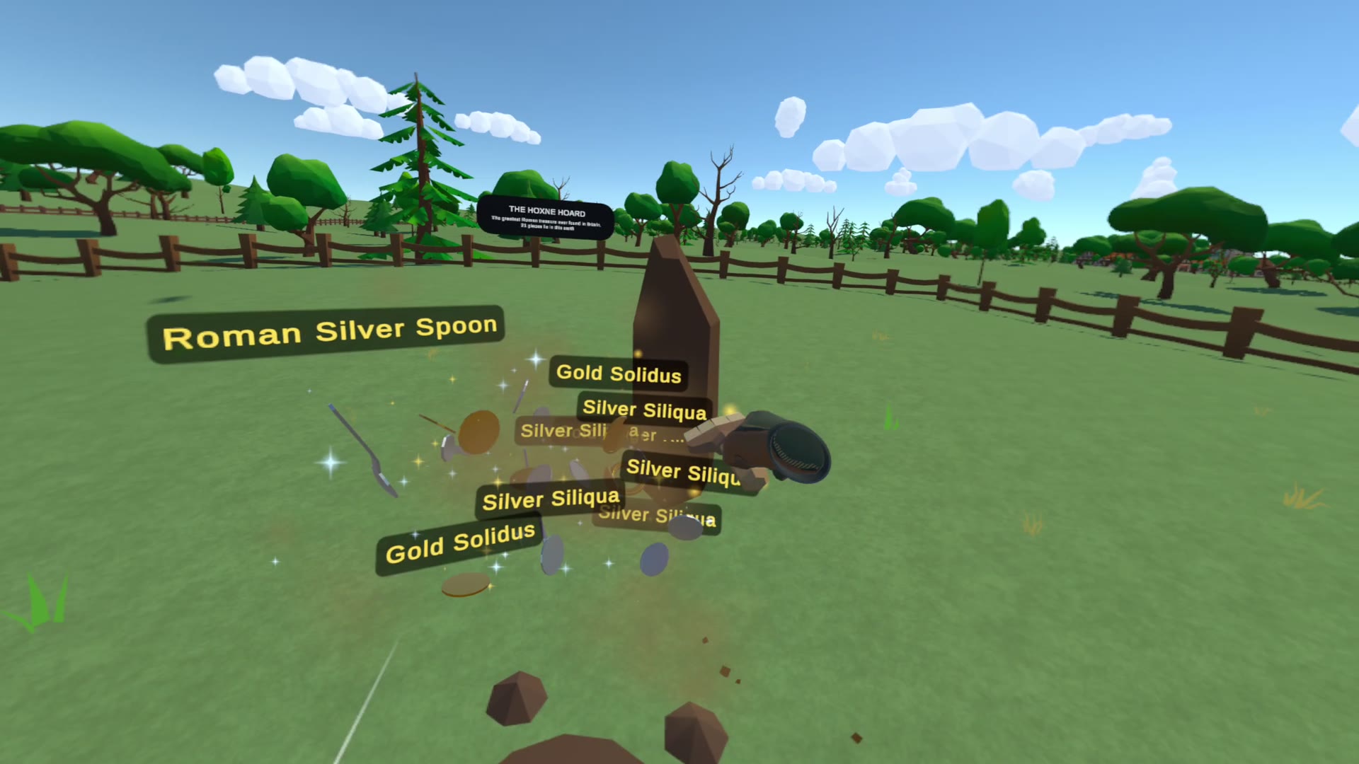 Hoxne — the hoard breaks out of its block of soil: gold solidi, silver siliquae and a Roman silver spoon.